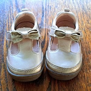 Stride Right gold baby shoes